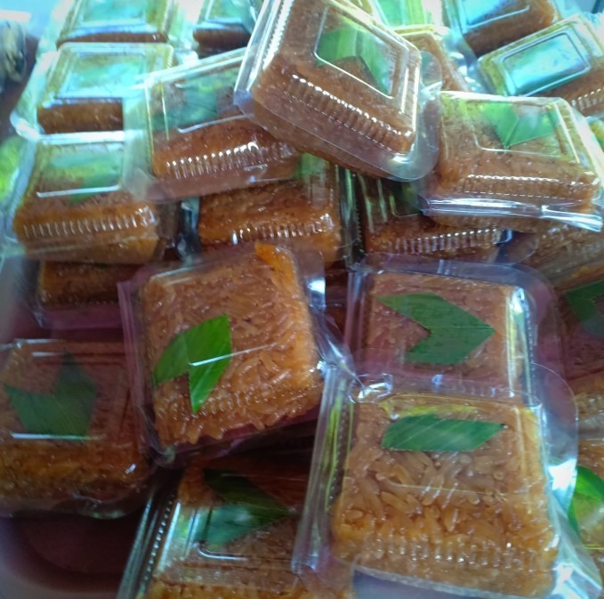 KUE BU MASNAWATI